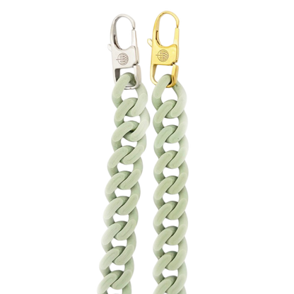 SeaChain Bracenets in 3D Druck aus alten Fischernetzen hergestellt in Blassgrün mit kleinem Clip Karabiner in Gold oder Silber. 